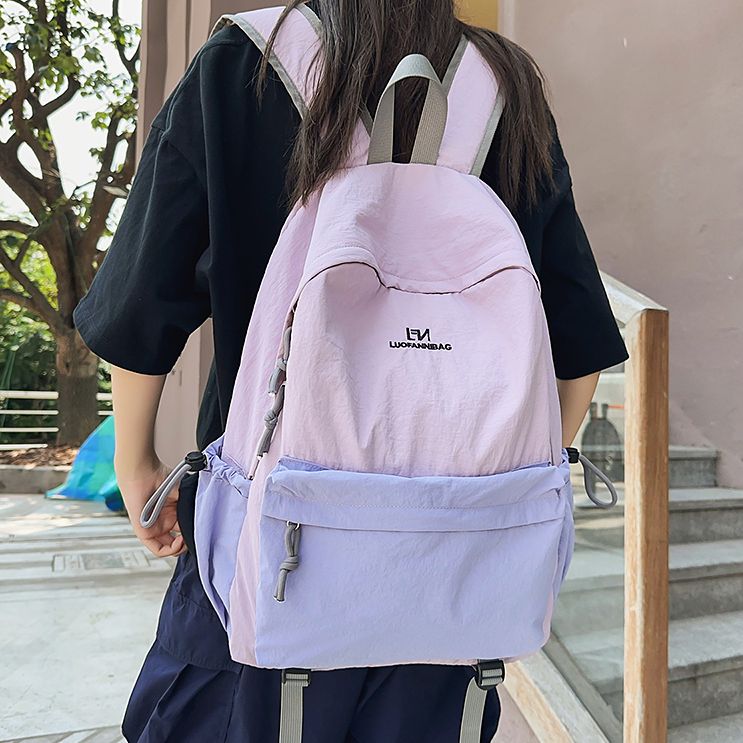 2025新款撞色双肩包女旅游轻便设计感小众大容量书包旅行登山背包