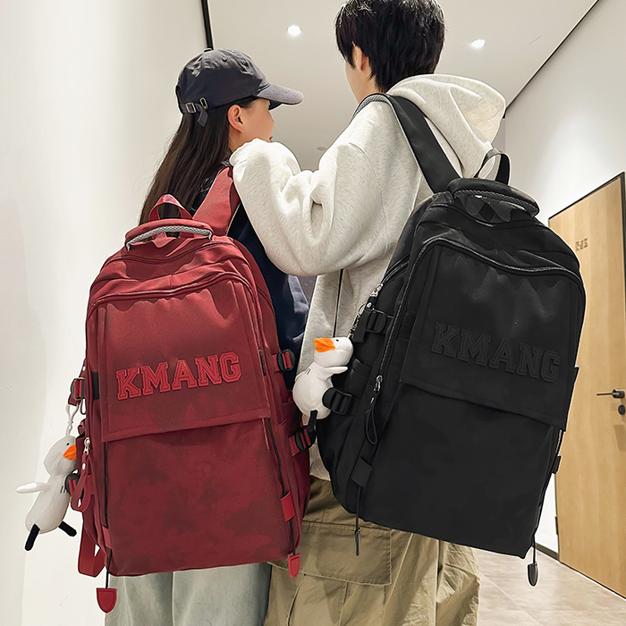 书包女生韩版高中大学生酒红色背包初中生小学生大容量减负双肩包
