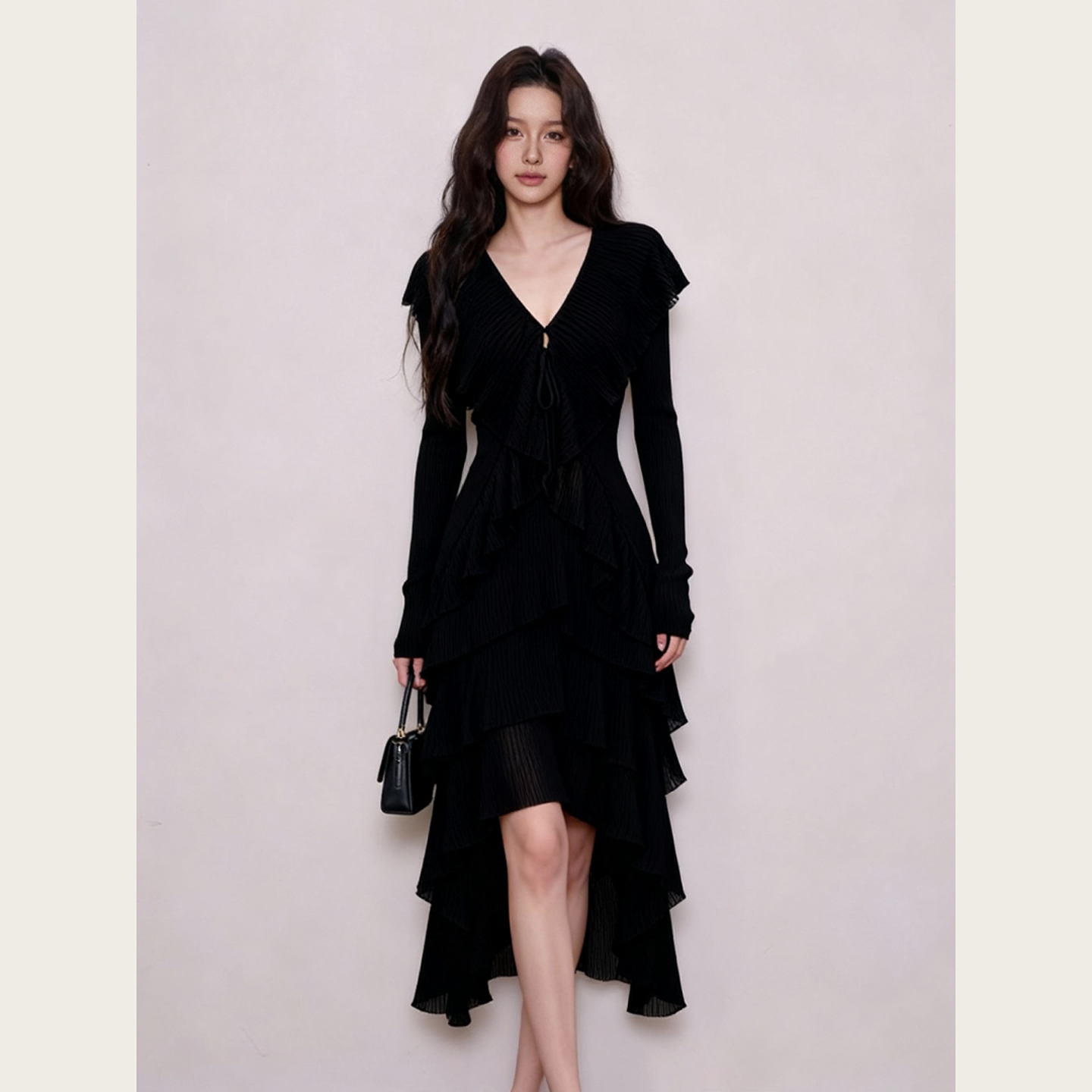 2025秋冬设计师款轻熟巨好看黑色连衣裙女木耳边针织不规则长裙