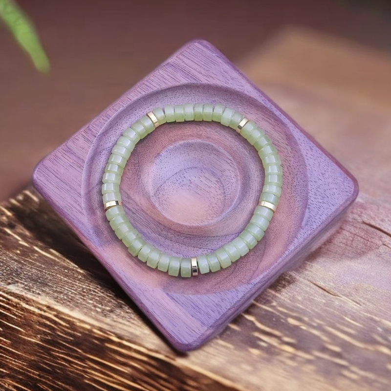 【仟璨珠宝】新疆若羌产地 069 新疆牛油果绿算盘 7mm