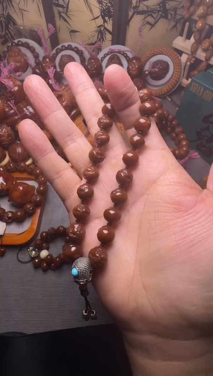 手串橄榄核大****子宝宝佛一个