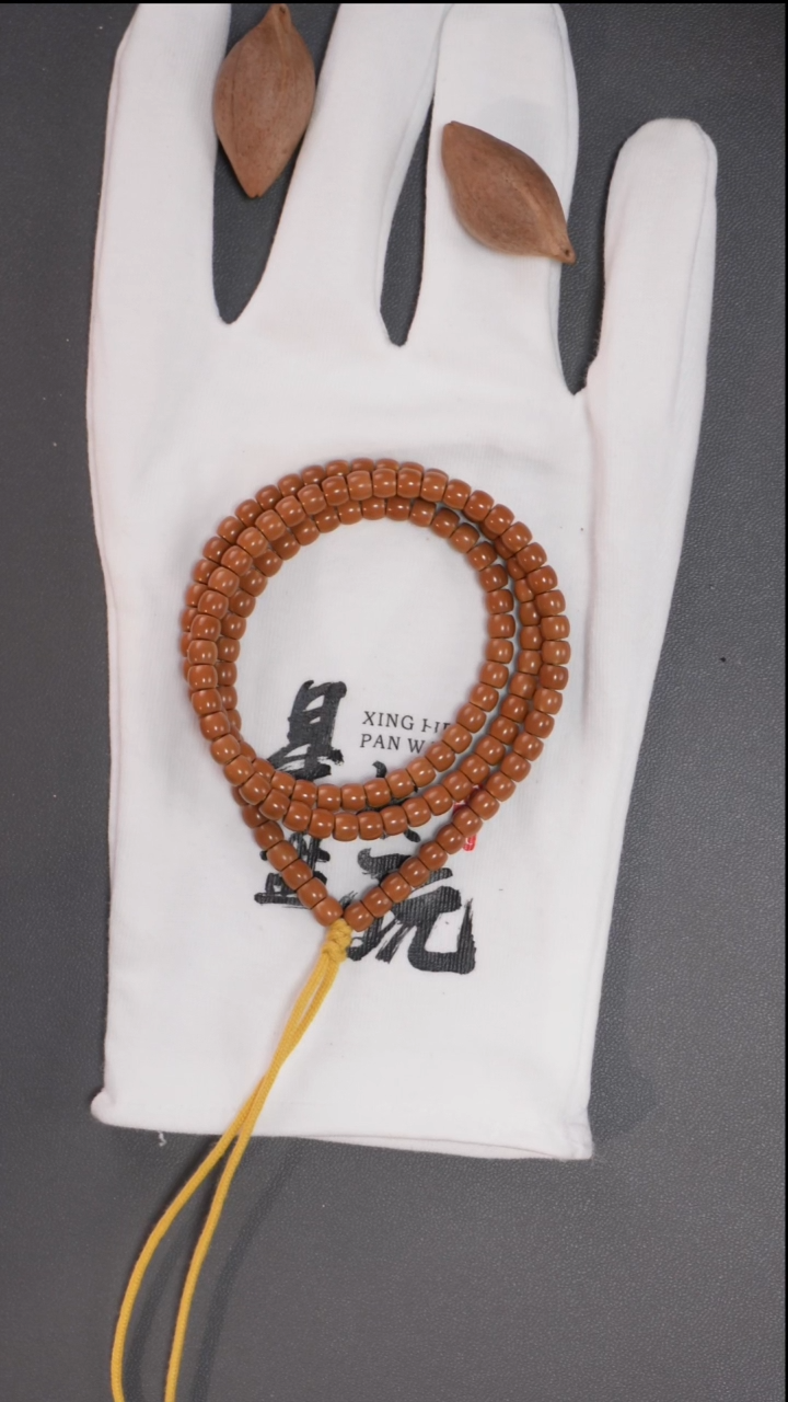 橄榄核吊坠5.3mm老挝红核直切正三花印记核尖长串