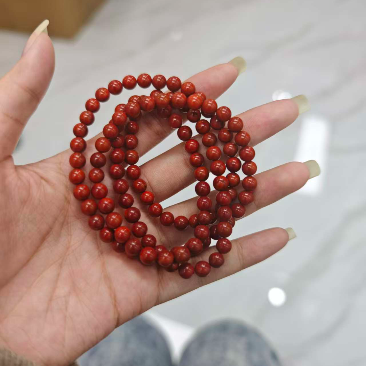 四川凉山瓦西料牛血红柿子红双色南红6mm