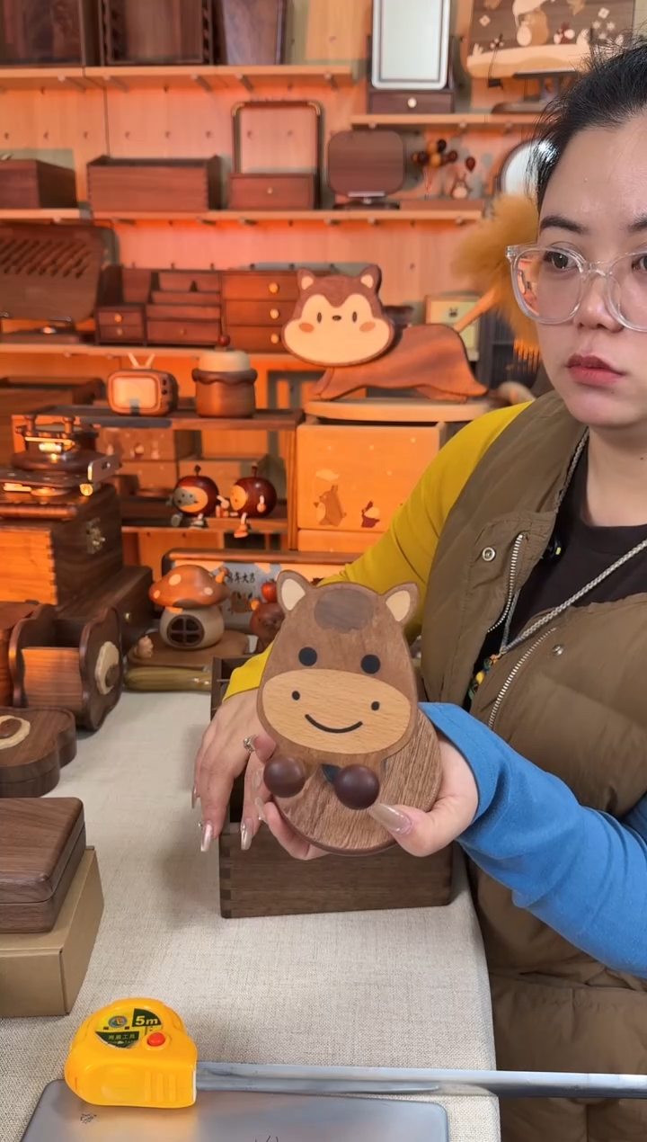 木 乌檀木实木小马手机支架