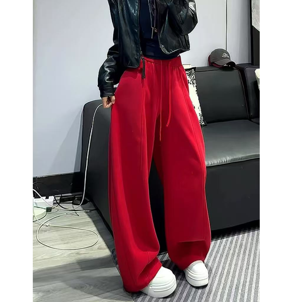 玲家精选89815款号喜庆红弯刀裤