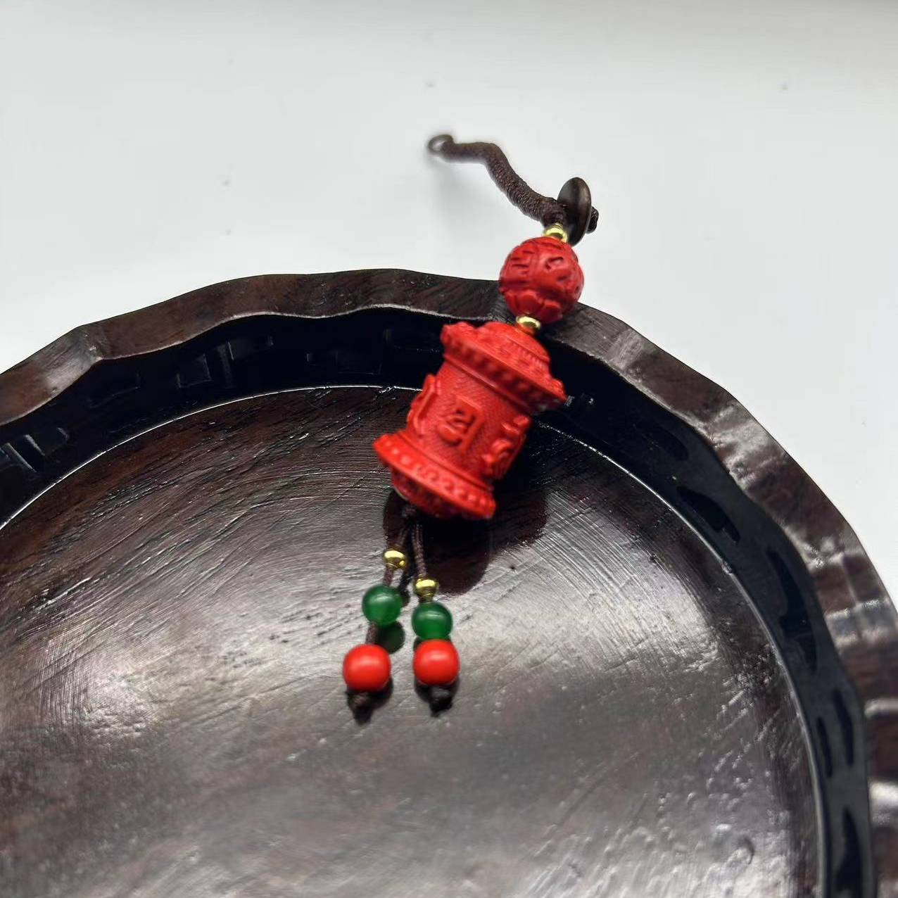 天然辰砂红砂转金桶挂件一个