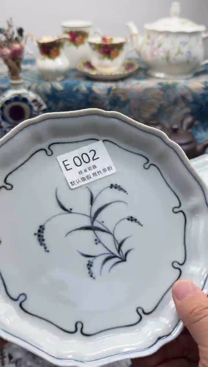 瓷片祎*         E002