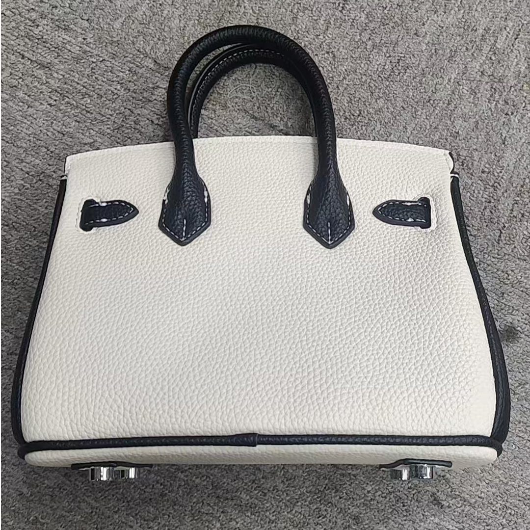 2025新款真皮女包双手提白拼黑色7720