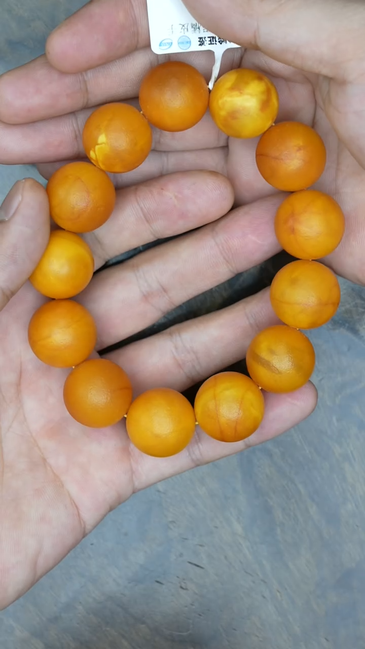 【闪购商品】琥珀裸石未镶嵌老蜡橘皮圆珠手串