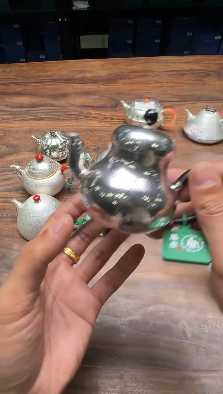 @****6呆坐 锤纹如意梨形壶