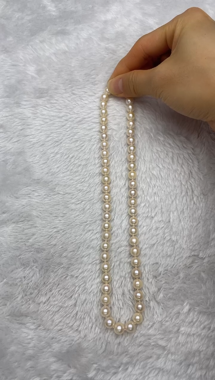 项链银S925镶嵌海水珍珠AK羽皇金7.5-8mm