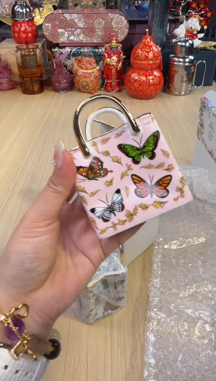 95粉色蝴蝶提包收纳罐