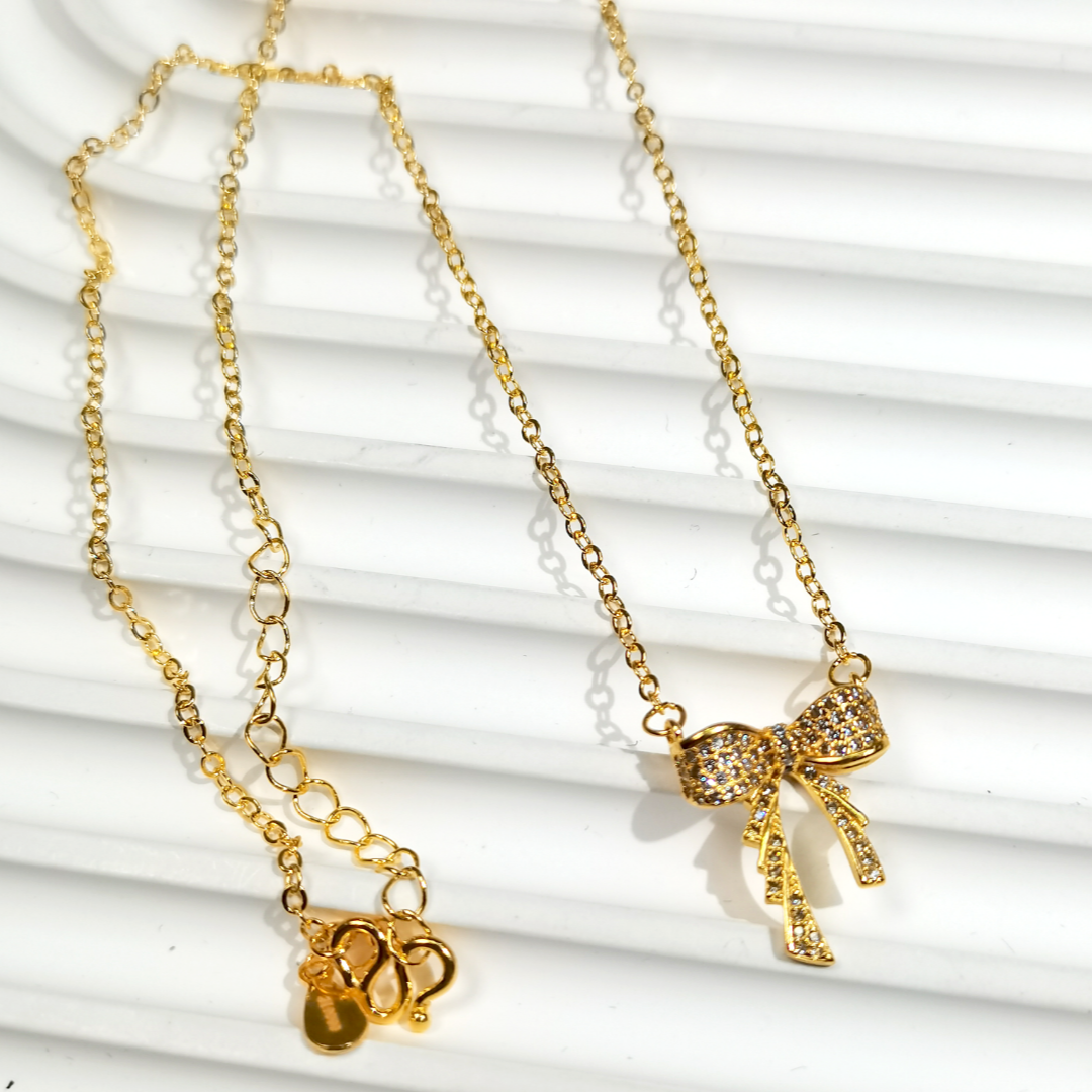 坠链均足银 闪z蝴蝶结套链