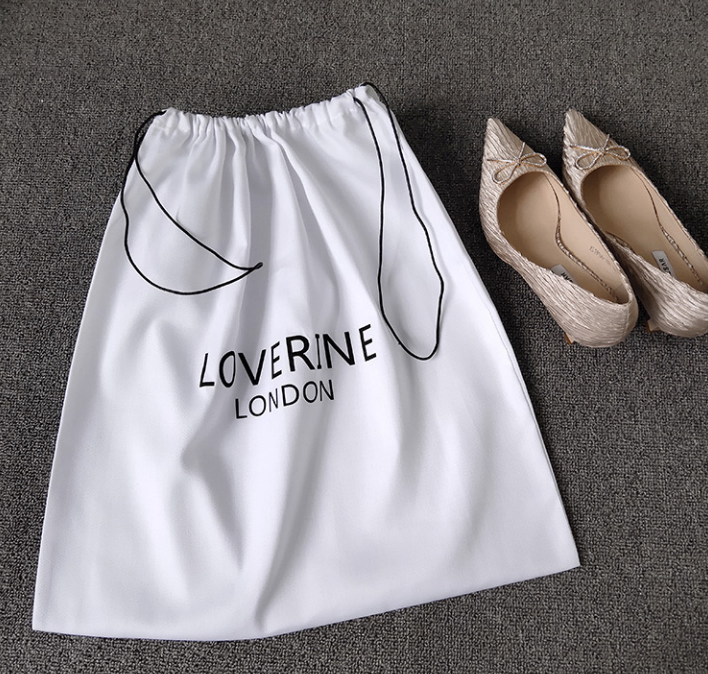 白色抽绳收纳袋中拍一发五