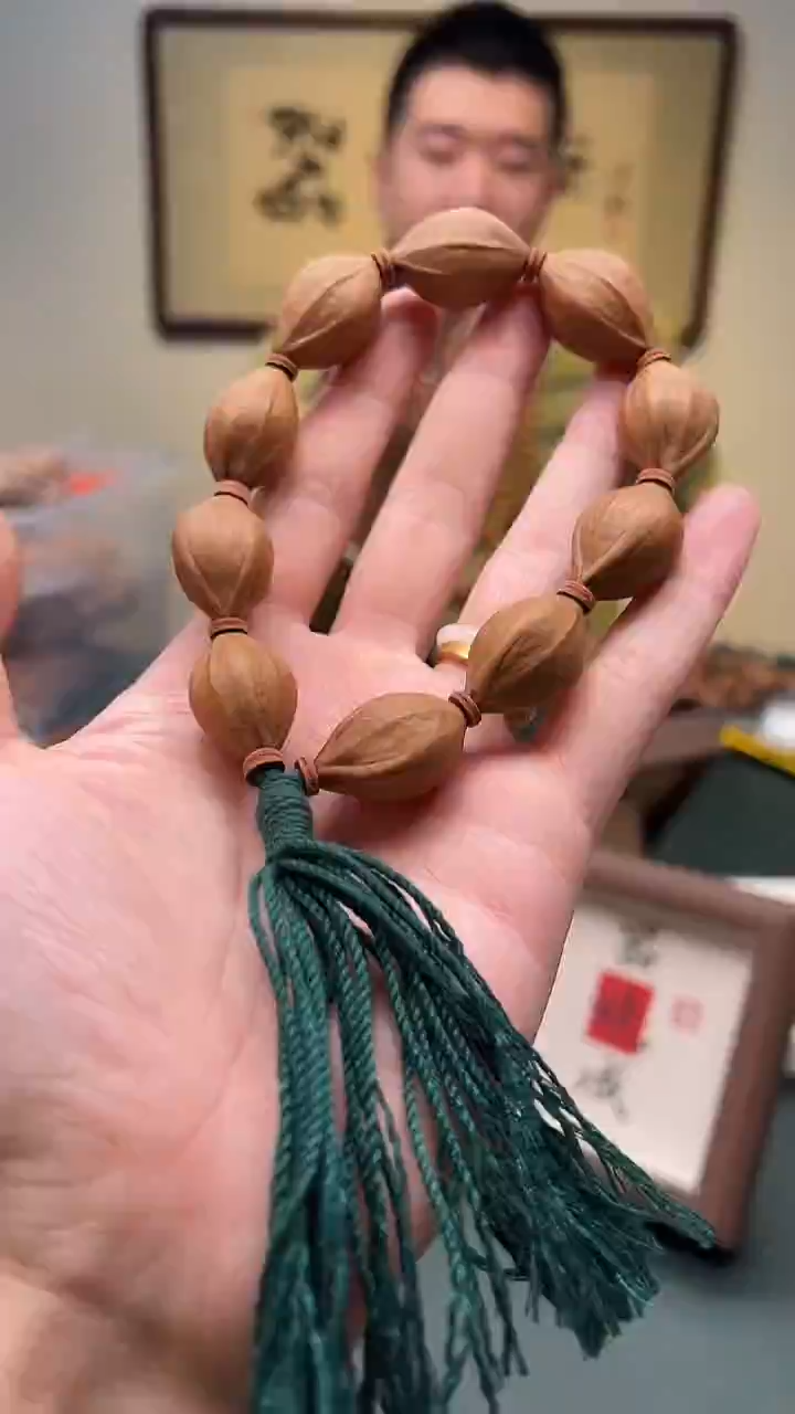 手串橄榄核叫*哥17-18mm左右正四花梅林铁核手持