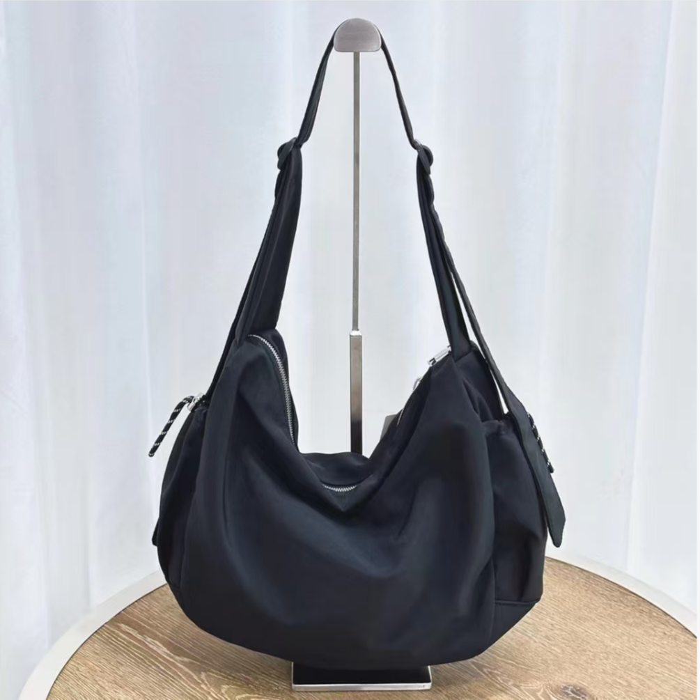 时尚款欧姐家爆款黑色饺子包