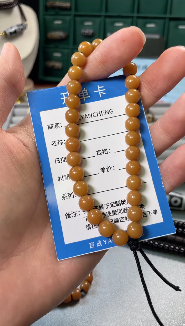 手串菩提根/象牙果剧*人手持 菩提根 风化