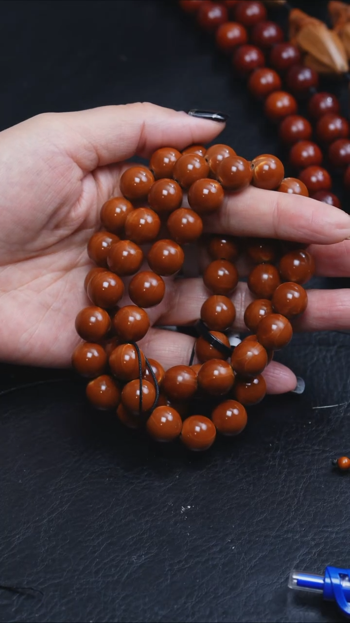 吊坠橄榄核家****”1.2正圆54颗尾款