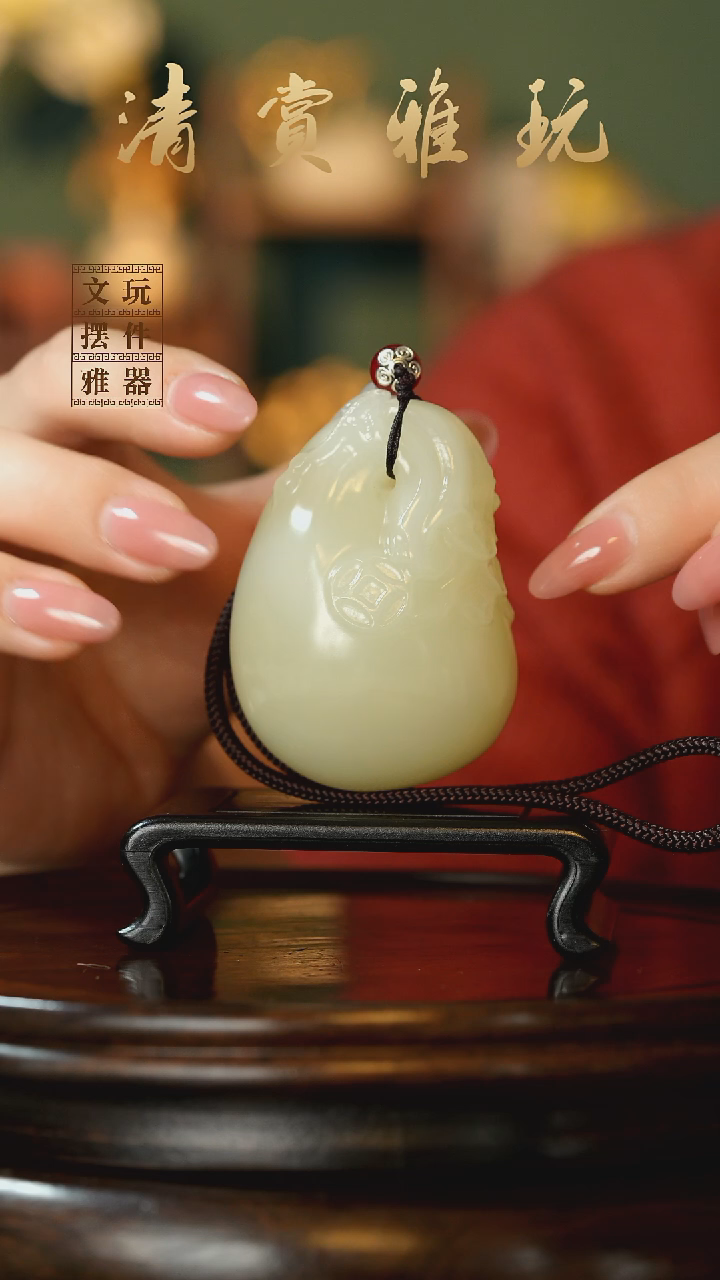 玉《钱袋子富得流油》手把件摆件