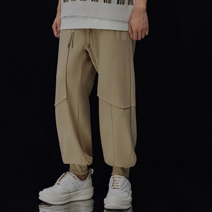 中国李宁成龙联名卫裤男子纯色束脚宽松百搭运动休闲长裤AKLT207