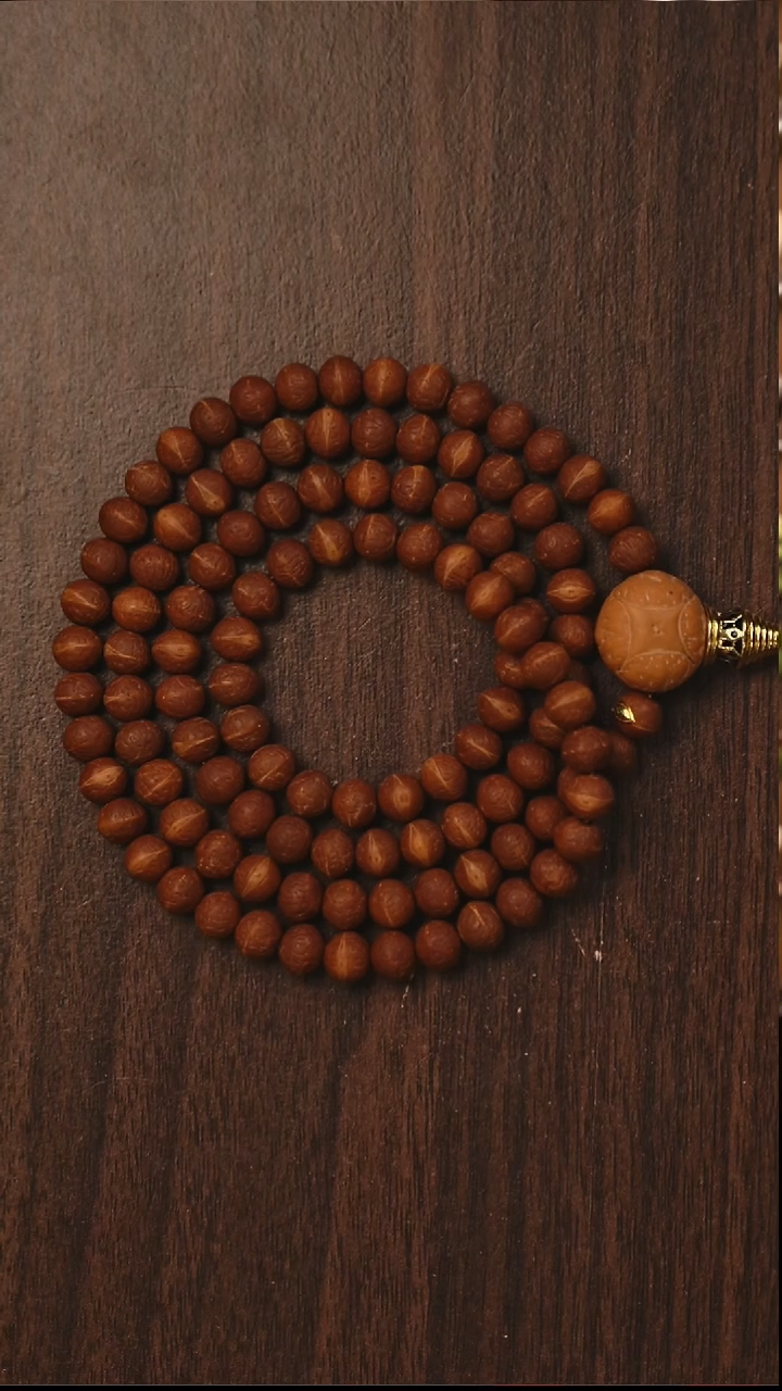 吊坠凤眼菩提@****@S04树王籽小凤眼金眼款