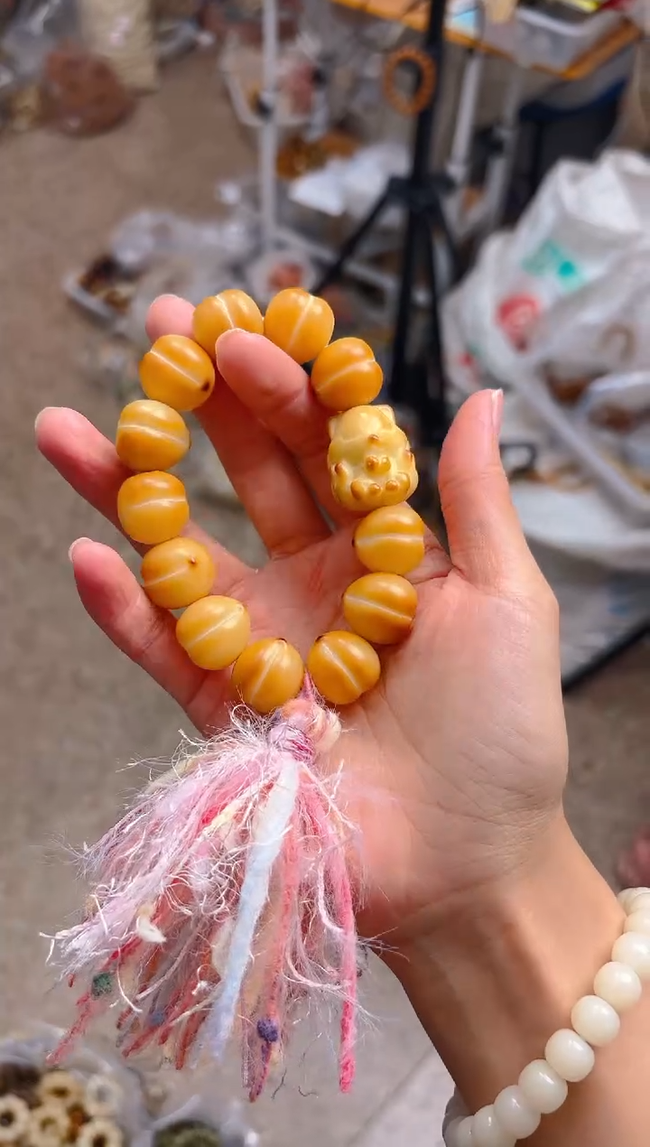 吊坠菩提根/象牙果黄色的屁桃 凤九手持