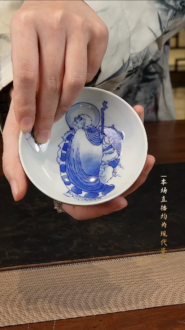 宁封窑青花人物纹单杯