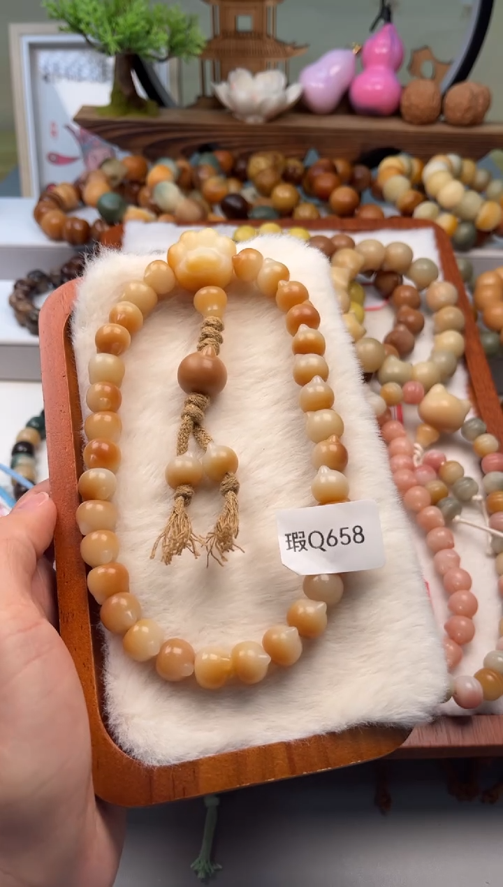 【闪购商品】菩提根/象牙果吊坠瑕Q658猫头手持12mm一串