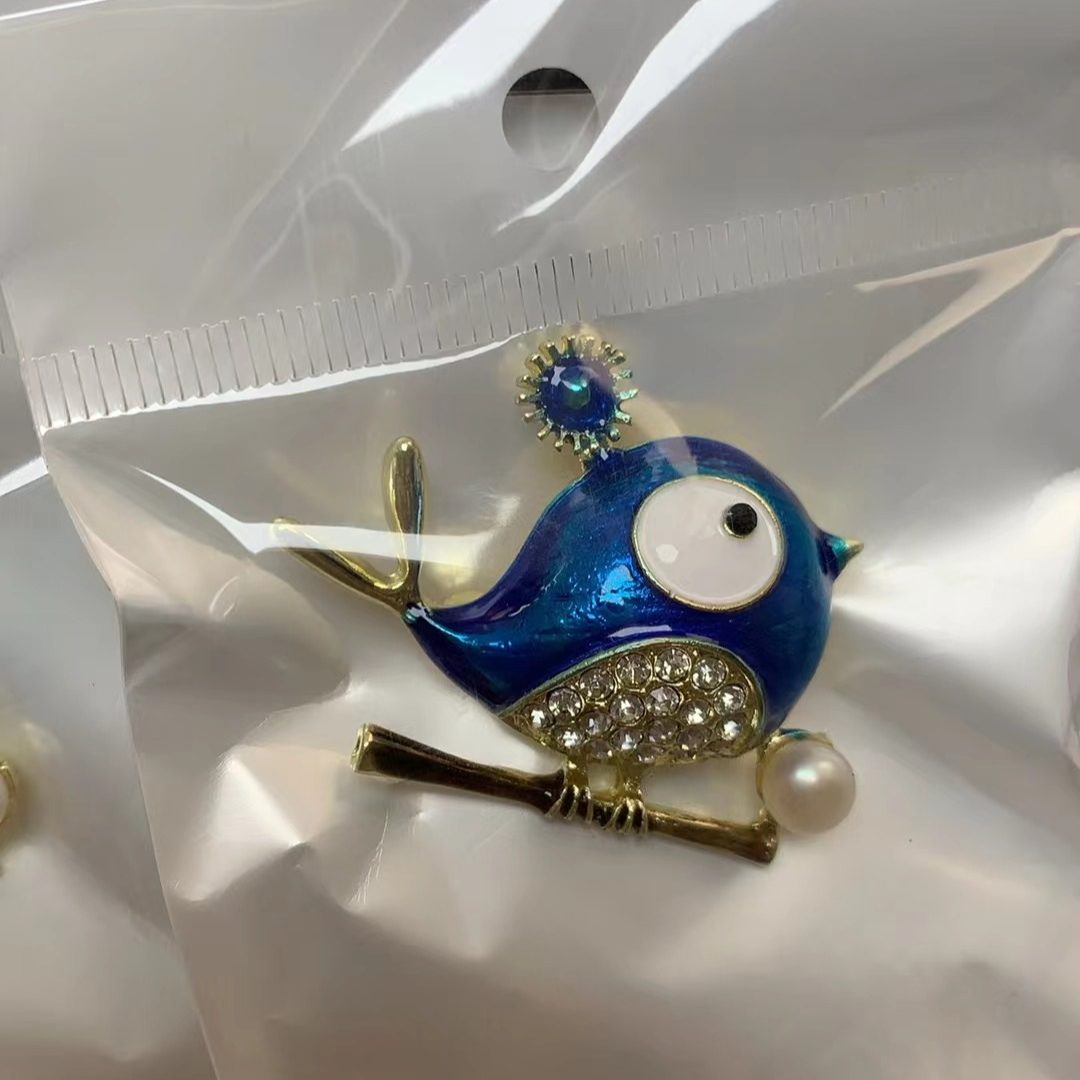 825 蓝色胖鸟珍珠胸针