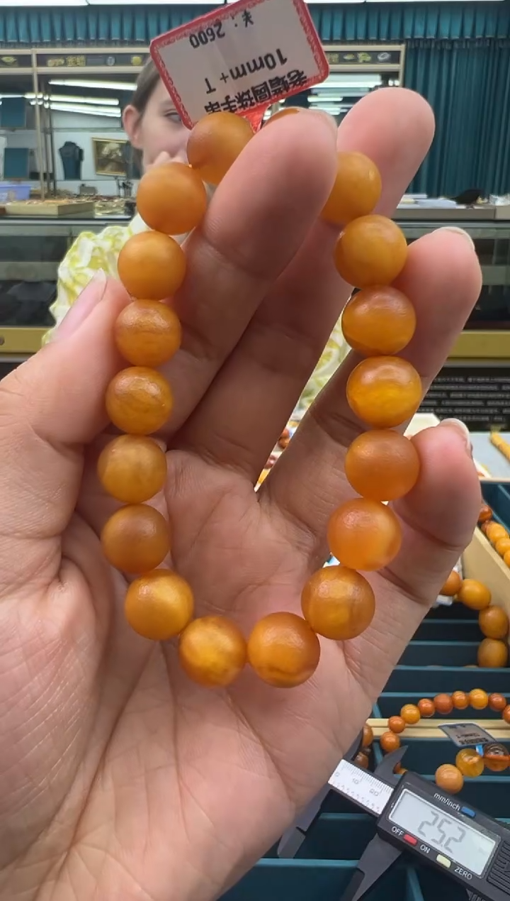 未镶嵌琥珀手串161秒拍号假一罚十