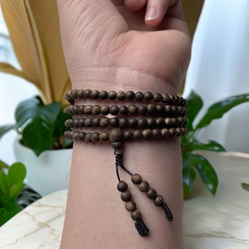 沉香棋楠沉香张勺子圆珠九五沉卡4手串