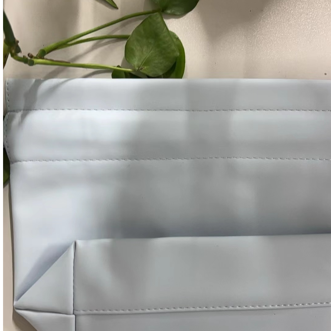 小科啊~蓝色抽绳袋包包