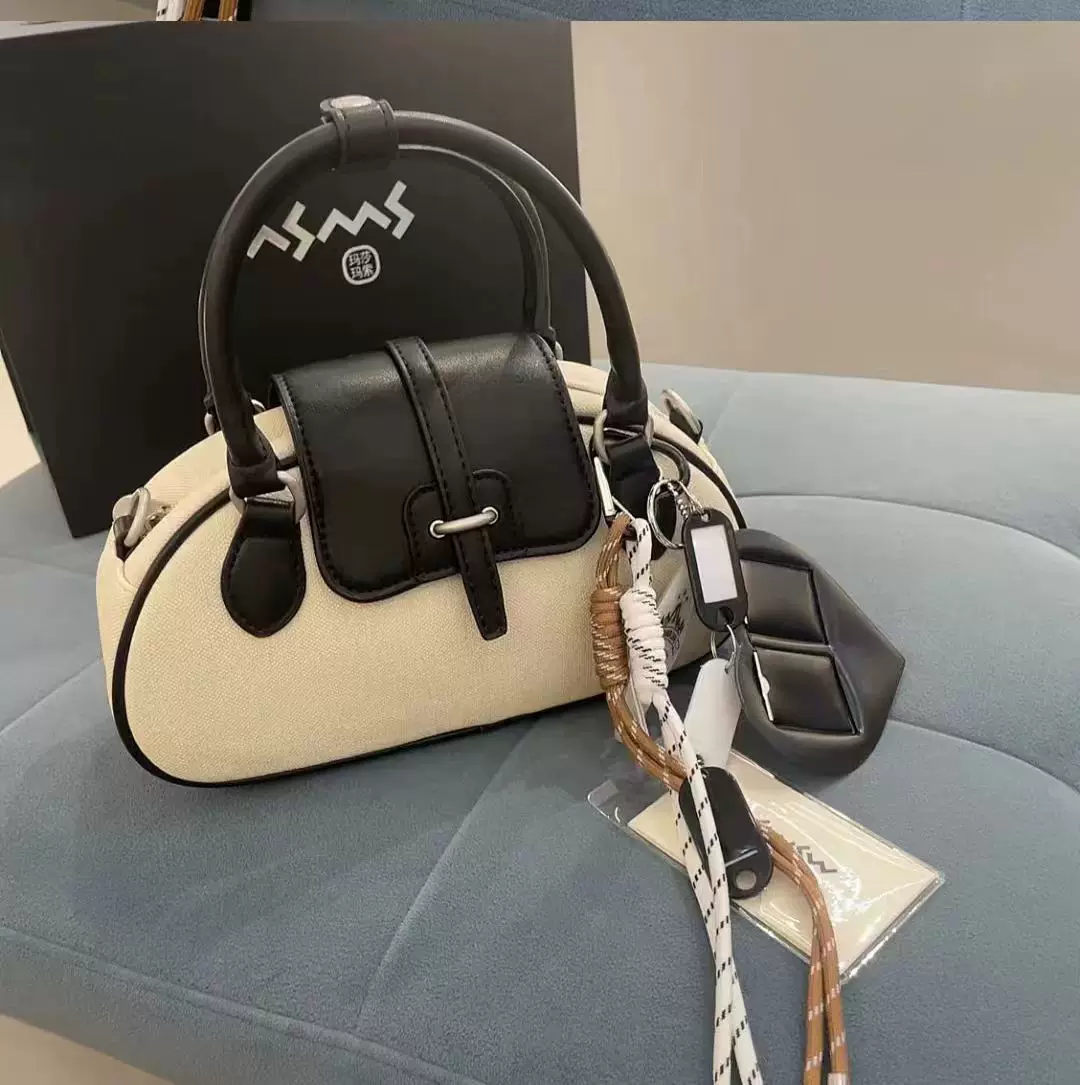 单根纯色单肩斜挎包包斜挎包轻奢经典椭圆形