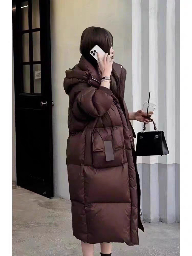 羽绒服女中长款过膝2025新款宽松大皮带设计中长款冬季潮流加厚