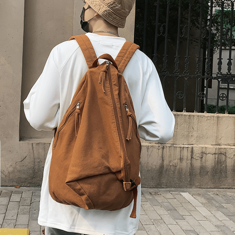 西藏包邮新疆发货复古男士帆布双肩包高中大学生书包潮流休闲大容