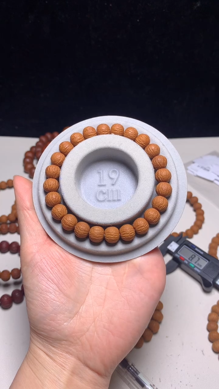 手串猴头核桃珍****金10＋麒麟纹凤羽