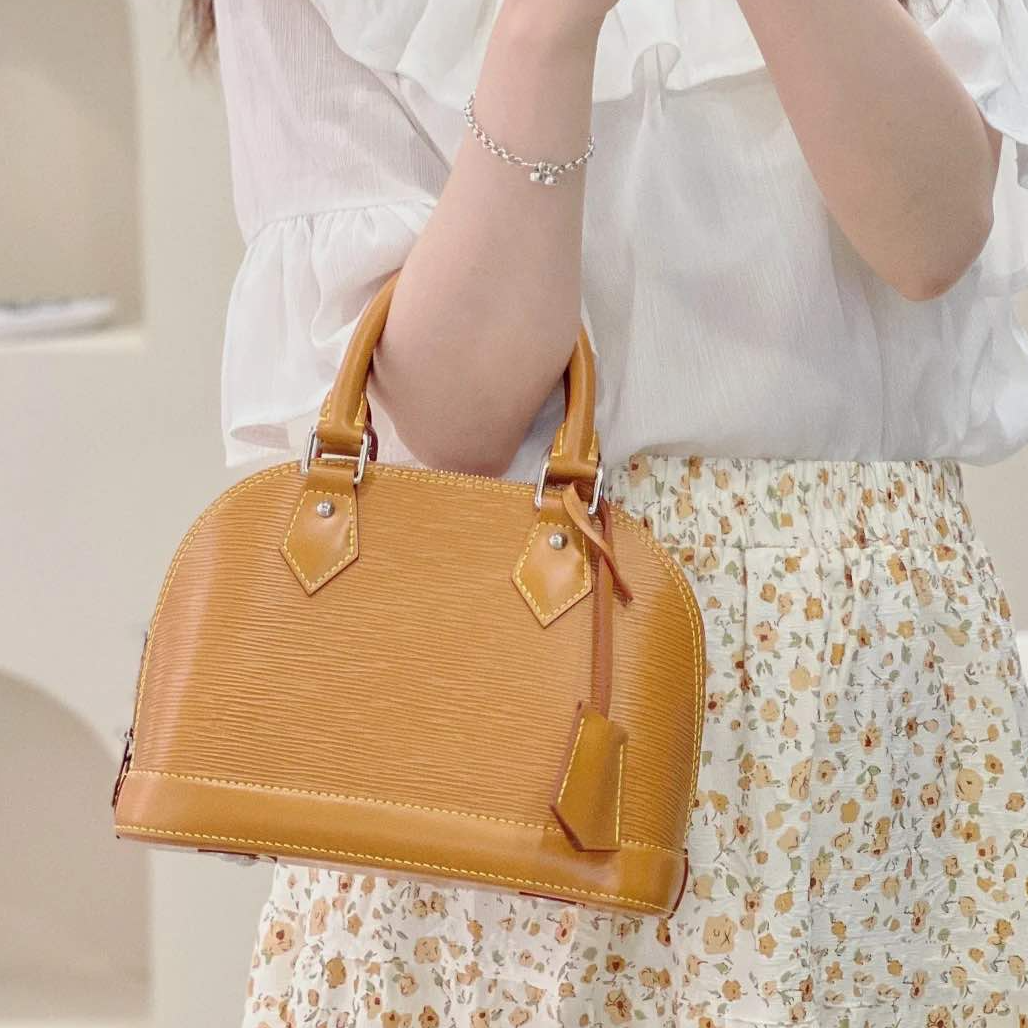 99新 LouisVuitton/路易威登 -100活动攀攀ALMA 贝壳包BB黄色芯片