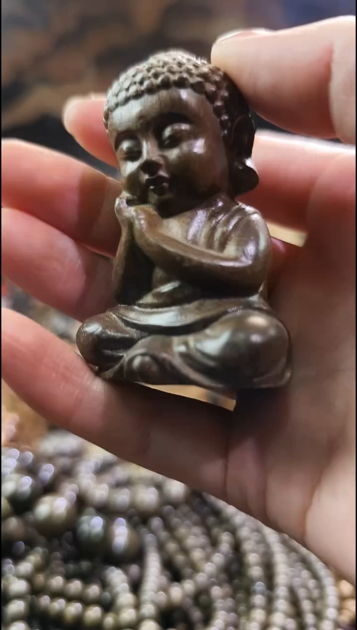 金丝楠宝宝佛手把件