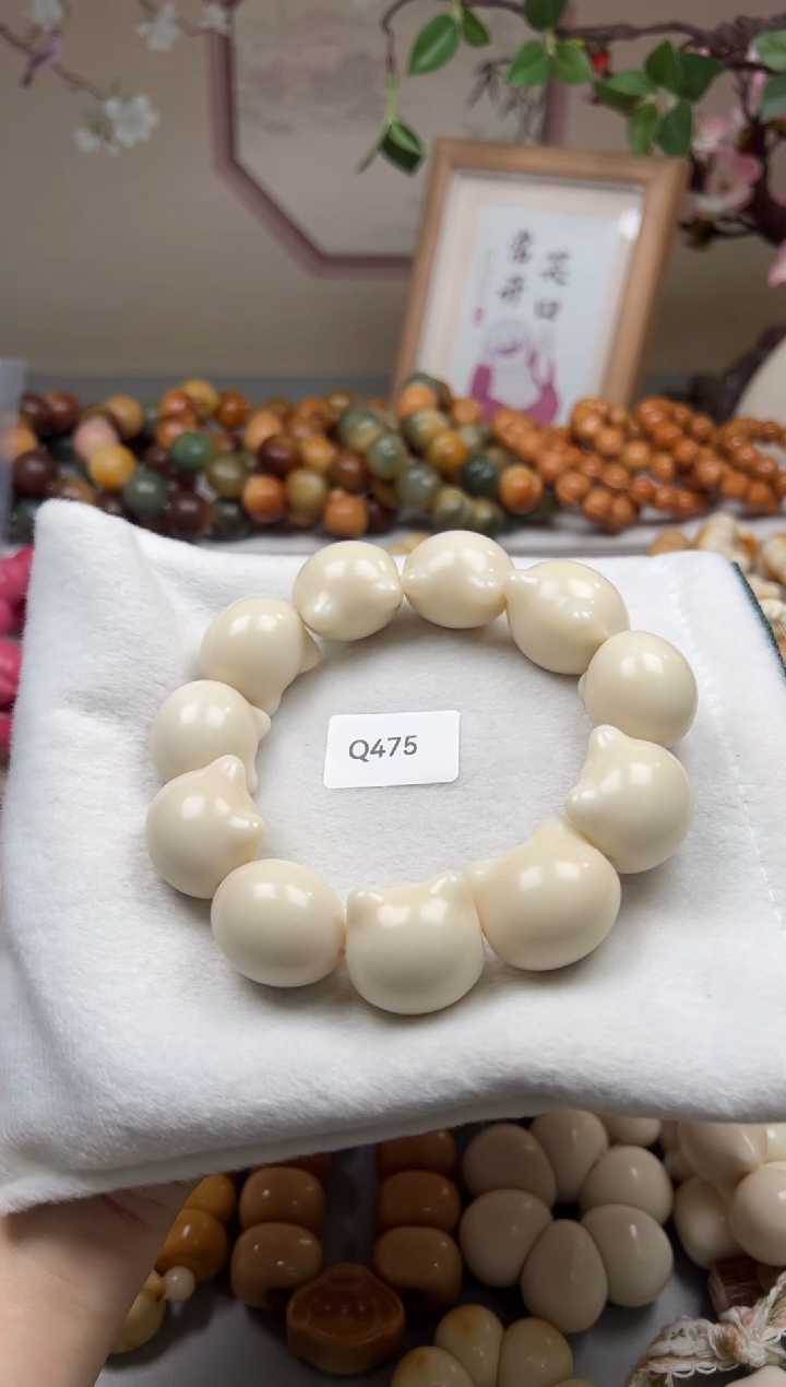 手串菩提根/象牙果像****?Q475牙果猫头25-26mm一串通货