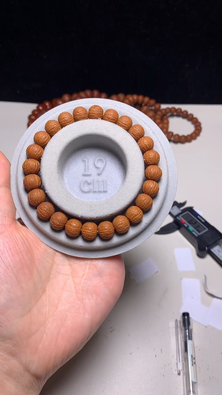 手串猴头核桃青*10＋麒麟纹凤羽