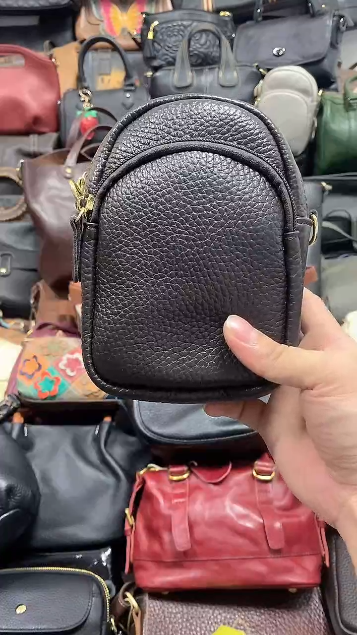 头层牛皮手机包695
