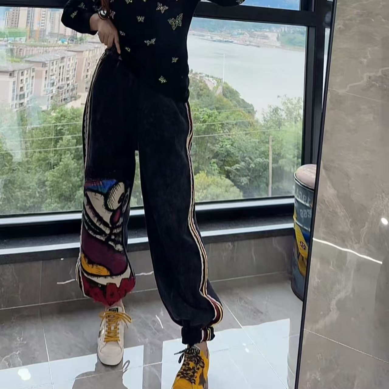 102小景推荐-欧版时尚彩条叮当猫加绒卫裤-38300