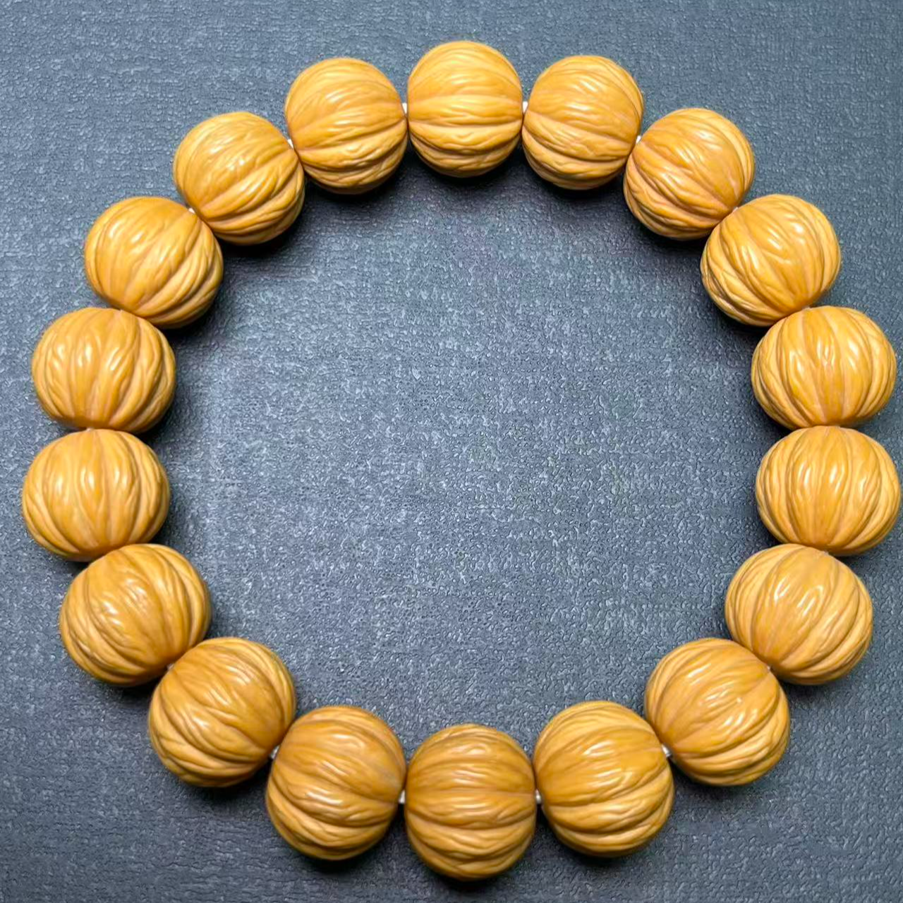 猴头核桃雕刻金丝十二棱手串