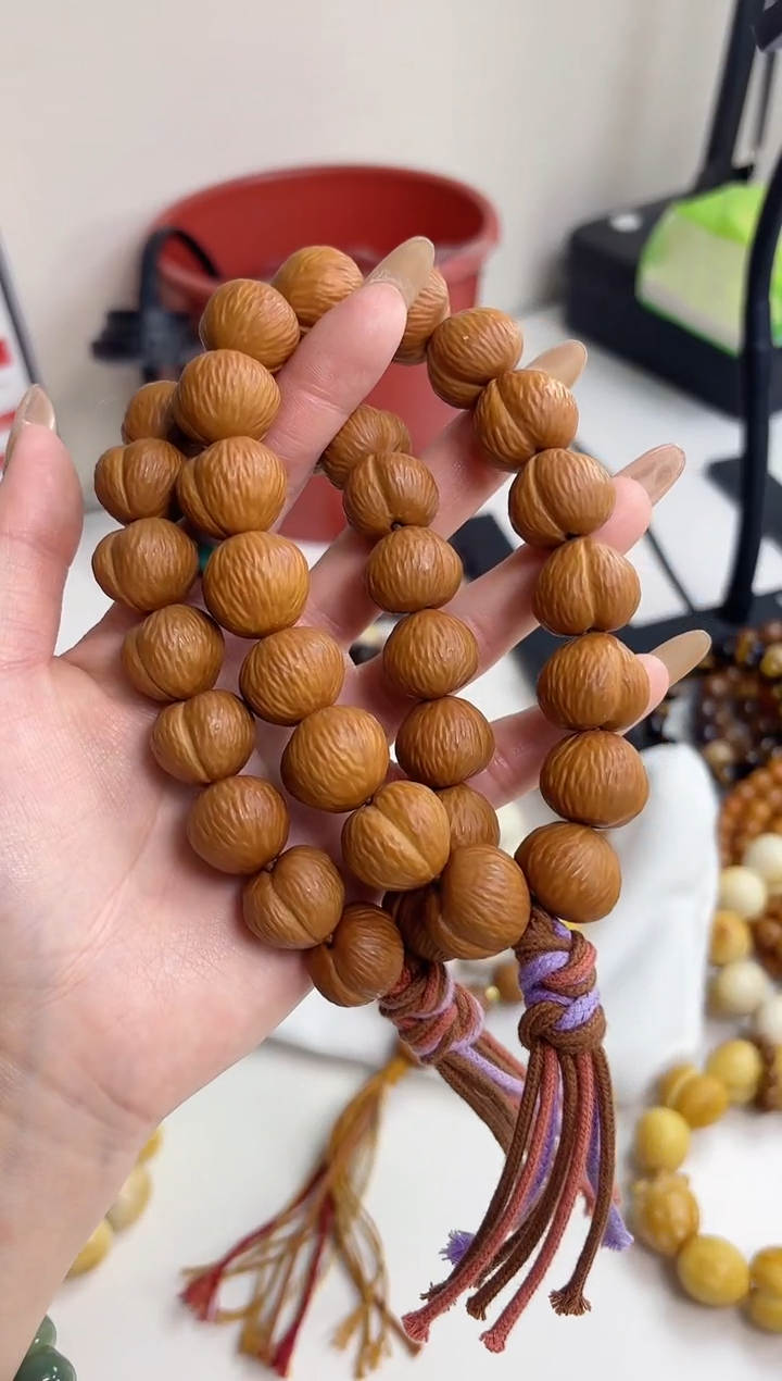 手串菩提根/象牙果猴头拉丝屁桃15*17mm手持