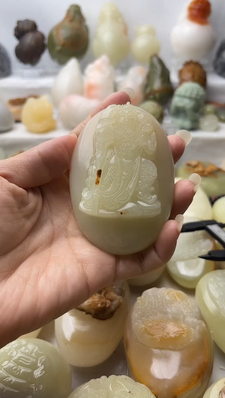 石材方解石手把件不退换关公