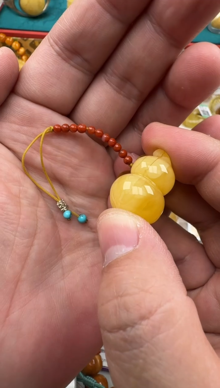 琥珀未镶嵌珠宝奇石如* 3.9克葫芦妖花吊坠HZ098