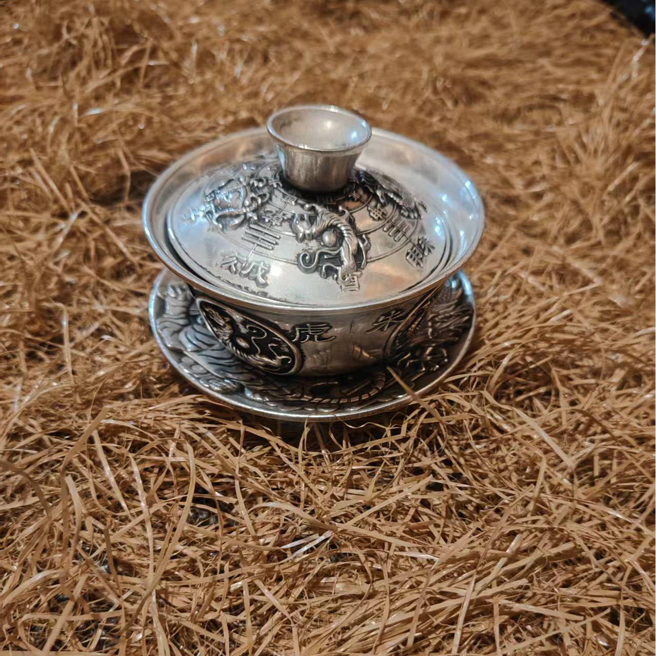 银色茶碗一个（流水摆件）