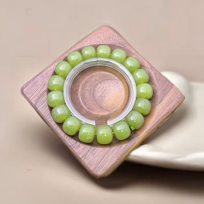 【佳玺珠宝】056 精美手串 晴水牛油果绿老型珠14mm