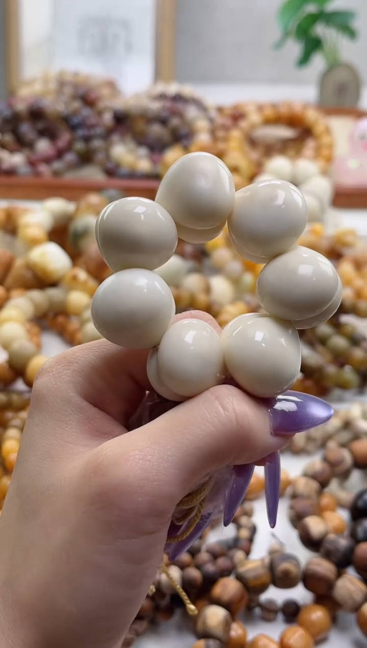 菩提根/象牙果手串象牙果爱心屁桃20*22手捻