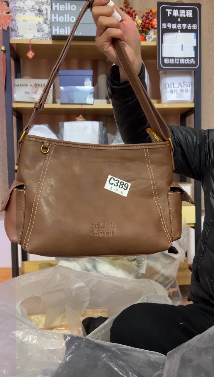 小牛剖层皮革老张家女包389